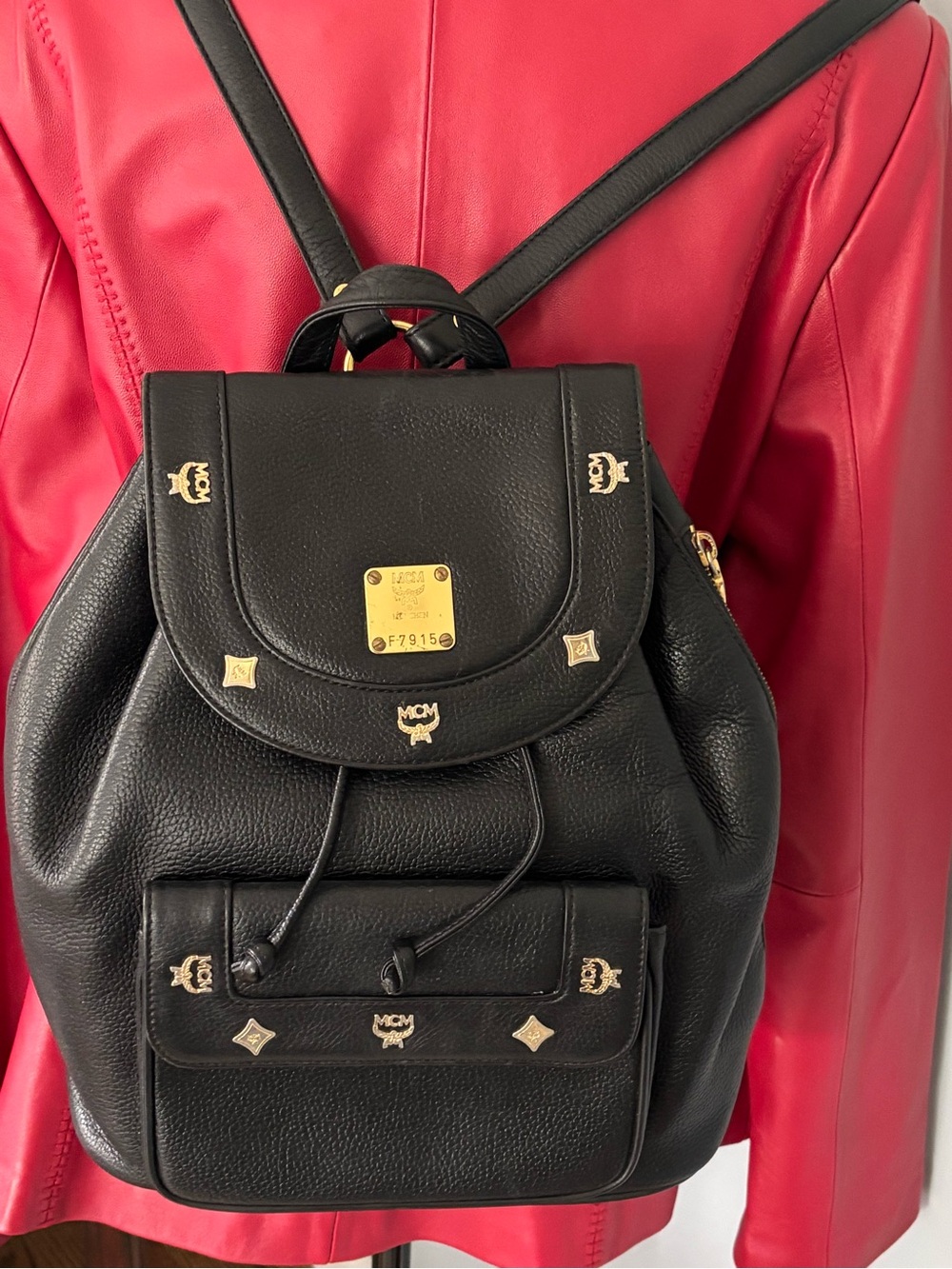 Vintage MCM Black Leather Visetos Logo Backpack with Gold Accents